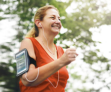 Woman running listening to music