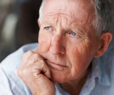 Close up of an senior man contemplating